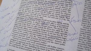 Notes in Dari (Benazir's native language) in the margins of a reading assignment