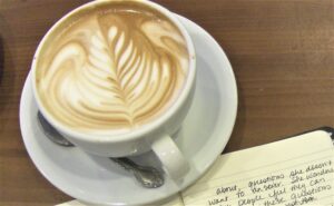 Latte coffee with leaf design in foam
